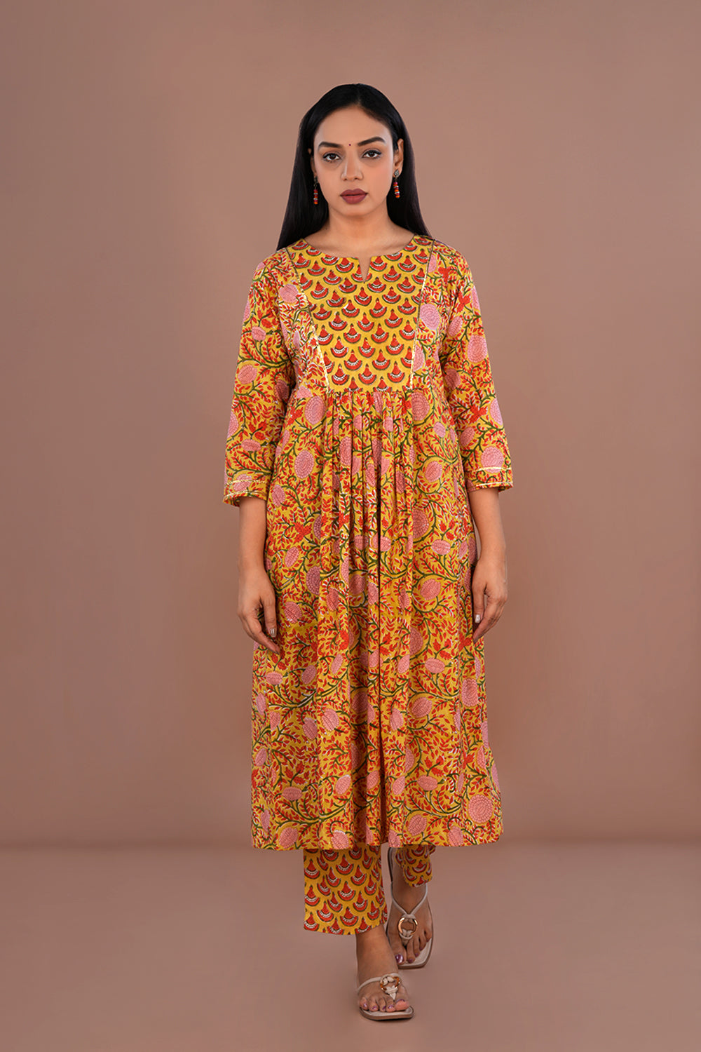 Image of Mustard yellow floral block printed cotton kurta and pants set